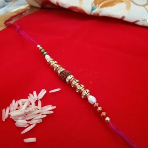 Round Beads Studded Rudraksh Rakhi